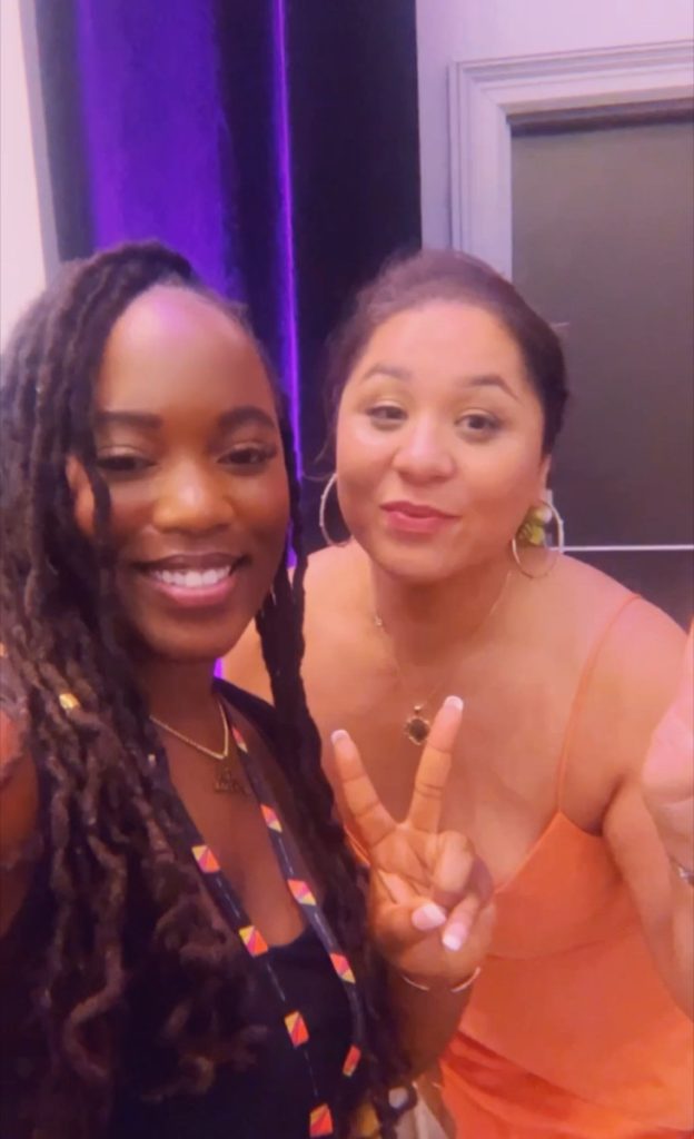 indian woman and black woman happy