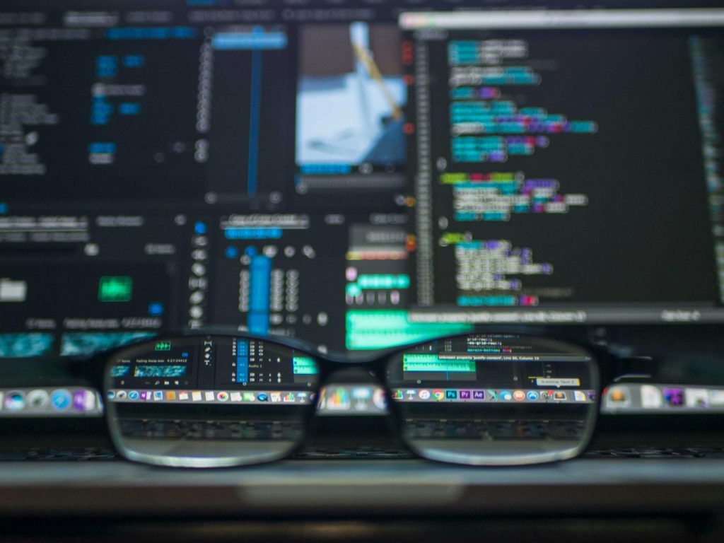 glasses and computer screen for coding
