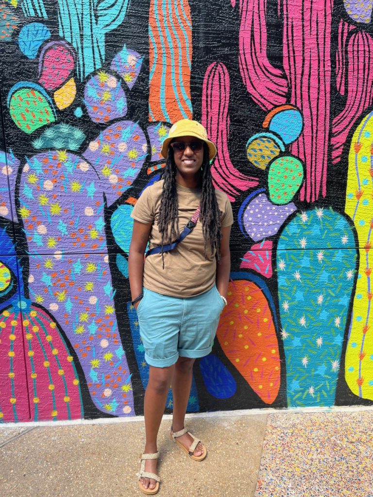 black woman with long locs
