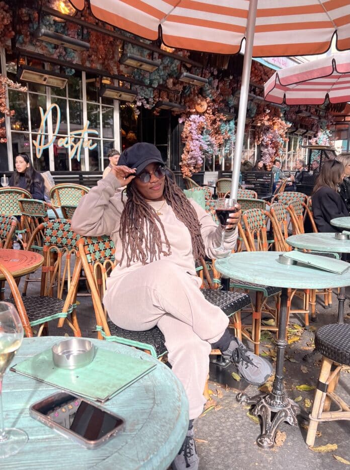 black in paris woman journaling her career change mindset shifts before a pivot